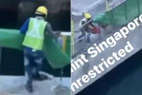 A video posted on Facebook shows a worker discarding construction debris and rubbish into the waters.