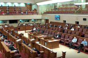 Parliament on Monday (May 9) unanimously approved amendments to the Constitution to update the disqualification criteria for MPs who were convicted and fined.