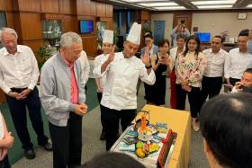 The cake reflected a selection of PM Lee Hsien Loong’s favourite items such as a bowl of mee siam and an assortment of books.