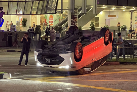 Photos of the aftermath showed an upside-down white Toyota.