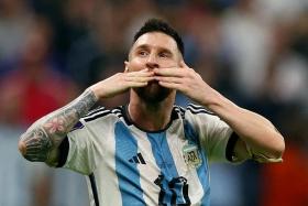 Argentina&#039;s Lionel Messi celebrates after Julian Alvarez scored their third goal against Croatia on Tuesday.     