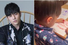 Jay Chou (left) posted on social media a video of his son drawing musical notes.