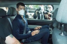 Novak Djokovic on his way to a court hearing in Melbourne on Jan 16, 2022.
