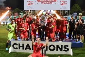 The Singapore Under-22 team lifting the Merlion Cup in 2019 after defeating Thailand U-22 1-0 in the final of the invitational tournament.