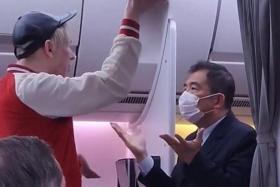A video posted on TikTok shows a passenger raising his voice at a flight attendant and demanding water.