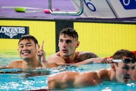 Singapore swimmer Teong Tzen Wei flashing a cheeky grin and victory sign after winning the 50m fly silver at the Commonwealth Games.
