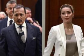 Johnny Depp (left) has denied ever being physically abusive towards Amber Heard.