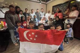 A group of Singaporeans living and working in Qatar, including Haqeem Nasser (right), are thrilled that the World Cup has arrived at their doorstep.