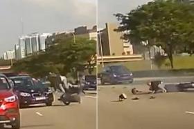 Dashboard camera footage of the accident shows a black car moving from the right-most lane into the path of the motorcycle.