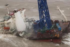 The engineering vessel suffered substantial damage and broke into two pieces during a typhoon.