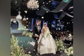 In photos circulating widely on social media, the bride can be seen decked out in a stunning white ballgown covered in lace and sparkles.