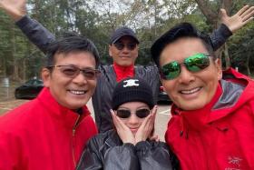 Hong Kong actress Adrian Wong (foreground, centre), daughter of actor Felix Wong (left), shared on social media photos of herself with her father and actors Chow Yun Fat (right) and Michael Miu.