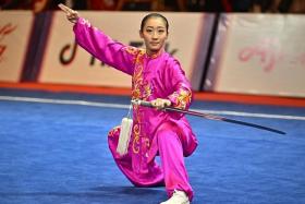 Singapore&#039;s Zeanne Law competing in the women taijiquan and taijijian combined finals of the wushu competition at the Cambodia SEA Games in May 2023.