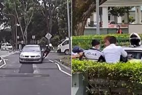 A video recording of the incident shows the driver and his passenger tussling with traffic police officers following a pursuit.