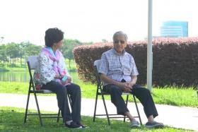 Tun Dr Mahathir Mohamad took a walk around the lake with his wife Siti Hasmah Mohd Ali and an entourage of staff.