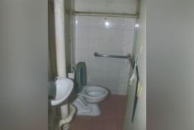 The two children were confined in the toilet and only allowed to come out for meals or when the man and his wife wanted to use the toilet.